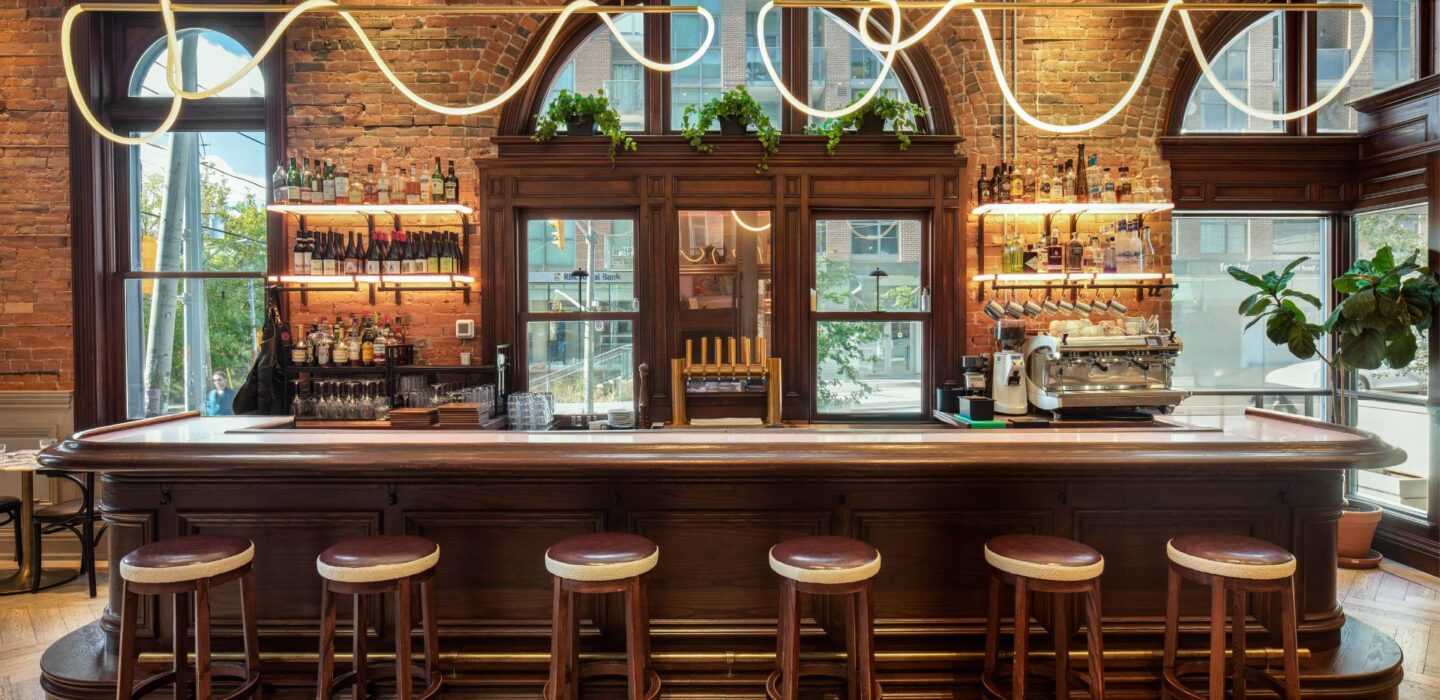 barstools in front of a bar counter