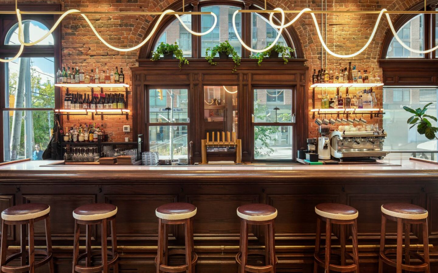 barstools in front of a bar counter
